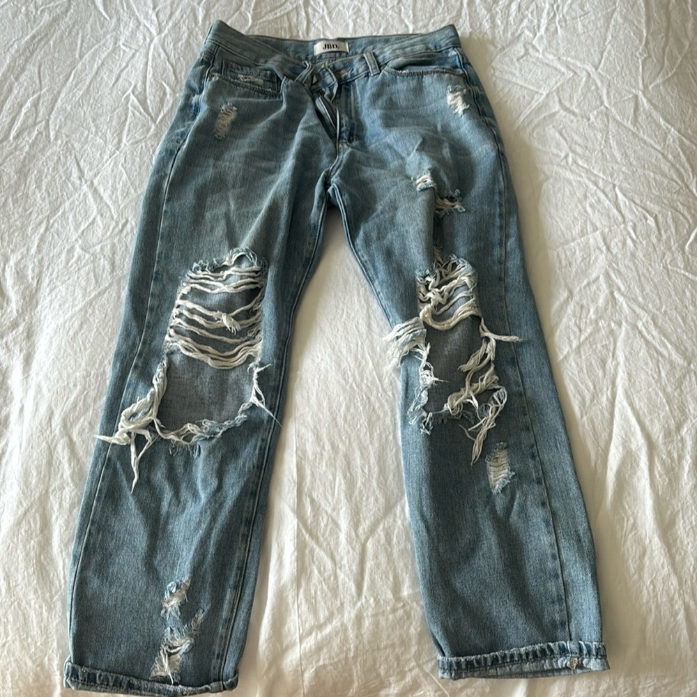 Ripped blue jeans